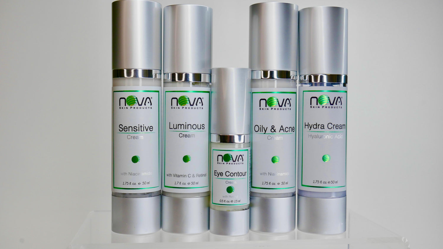 Four Nova skin care bottles on a white background