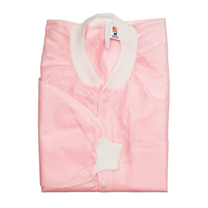 Folded pink quilt with white trim on a white background medium