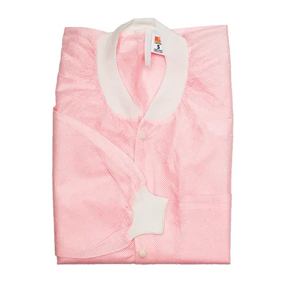 Folded pink quilt with white trim on a white background