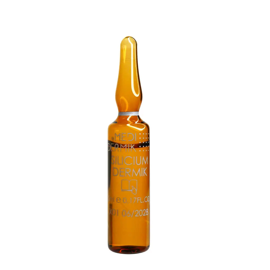 Amber glass ampoule with 'Slicicum Dermik' branding on a white background