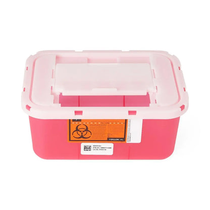 Pink medical sharps container with biohazard label on a white background