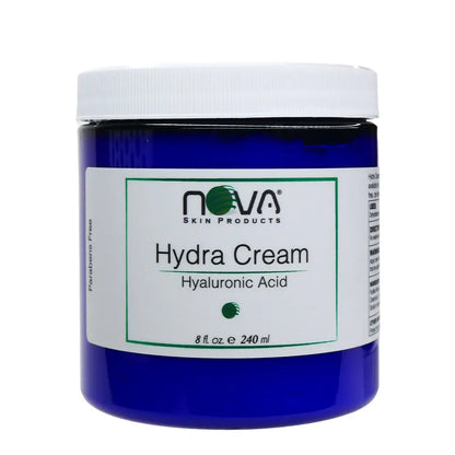 Blue jar of Nova Hydra Cream with a white lid on a white background