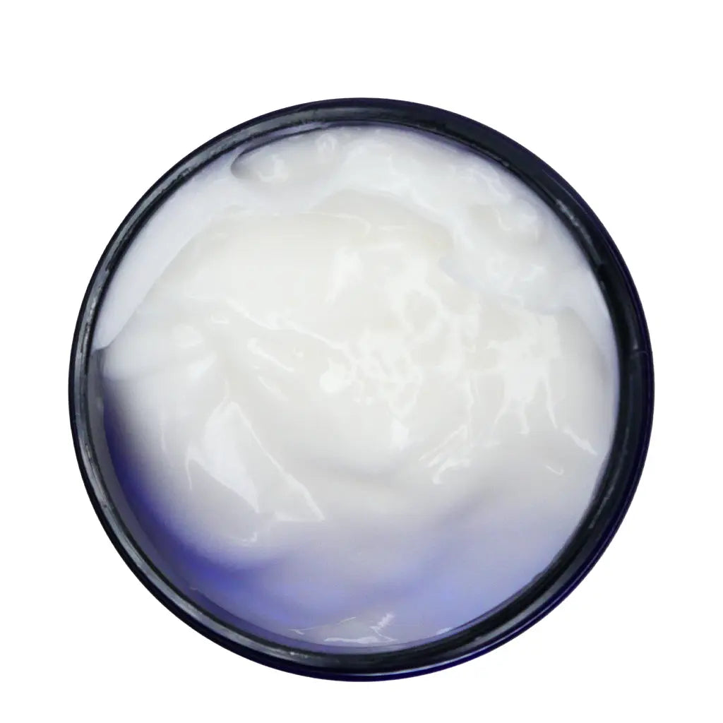 Jar of white cream on a white background