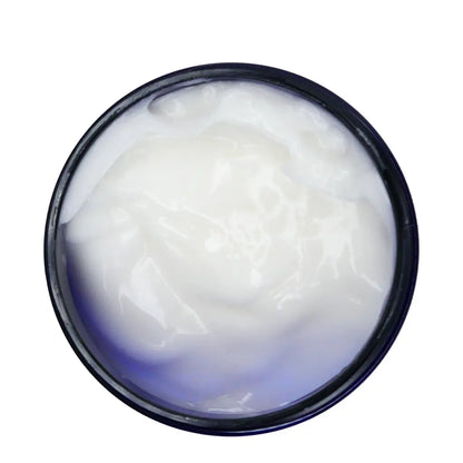 Jar of white cream on a white background